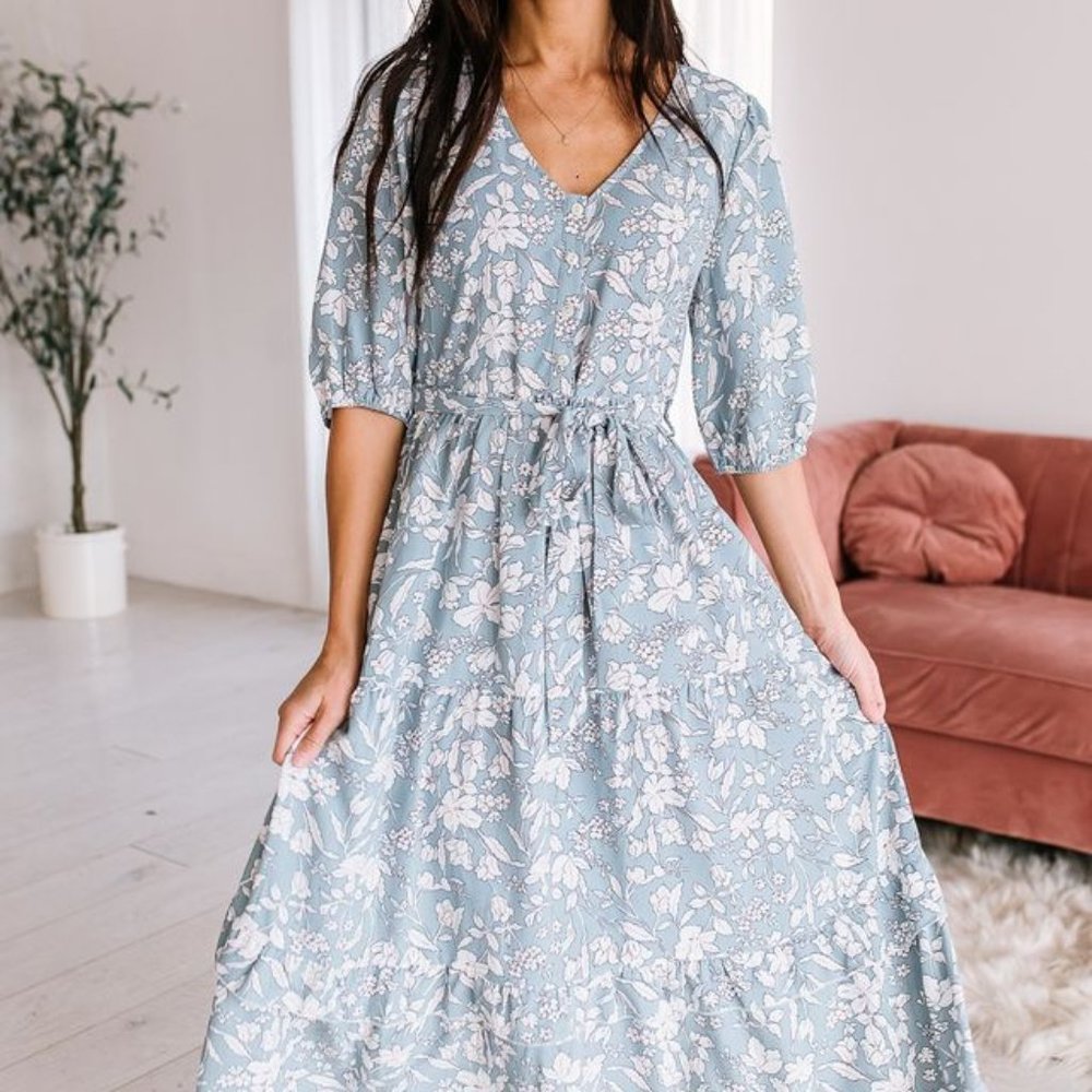 Gorgeous Floral Dress with functioning buttons, subtle ruffles, self tie…